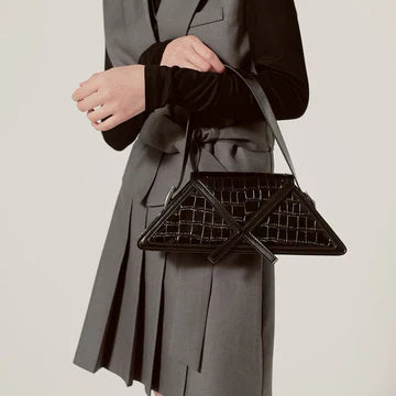 Geometric handbag with a structured design