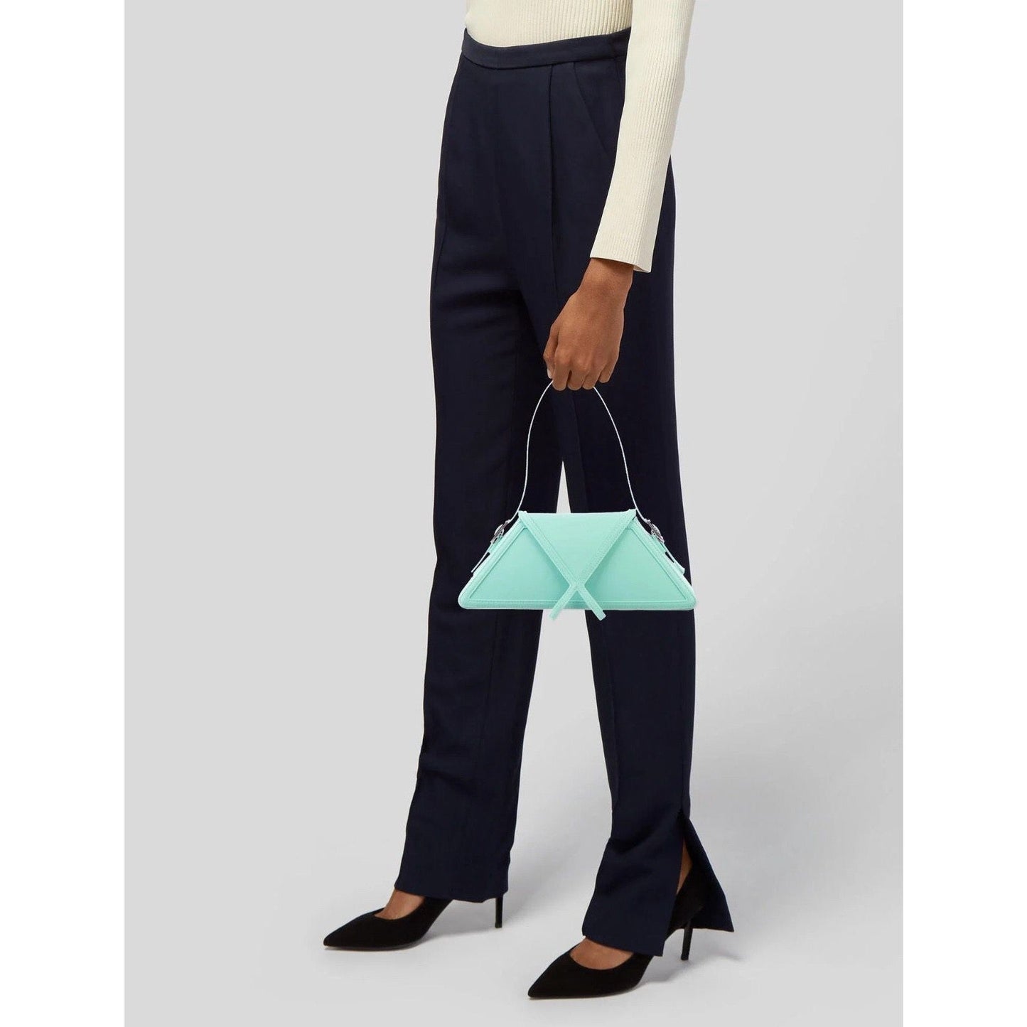 Geometric handbag with a structured design